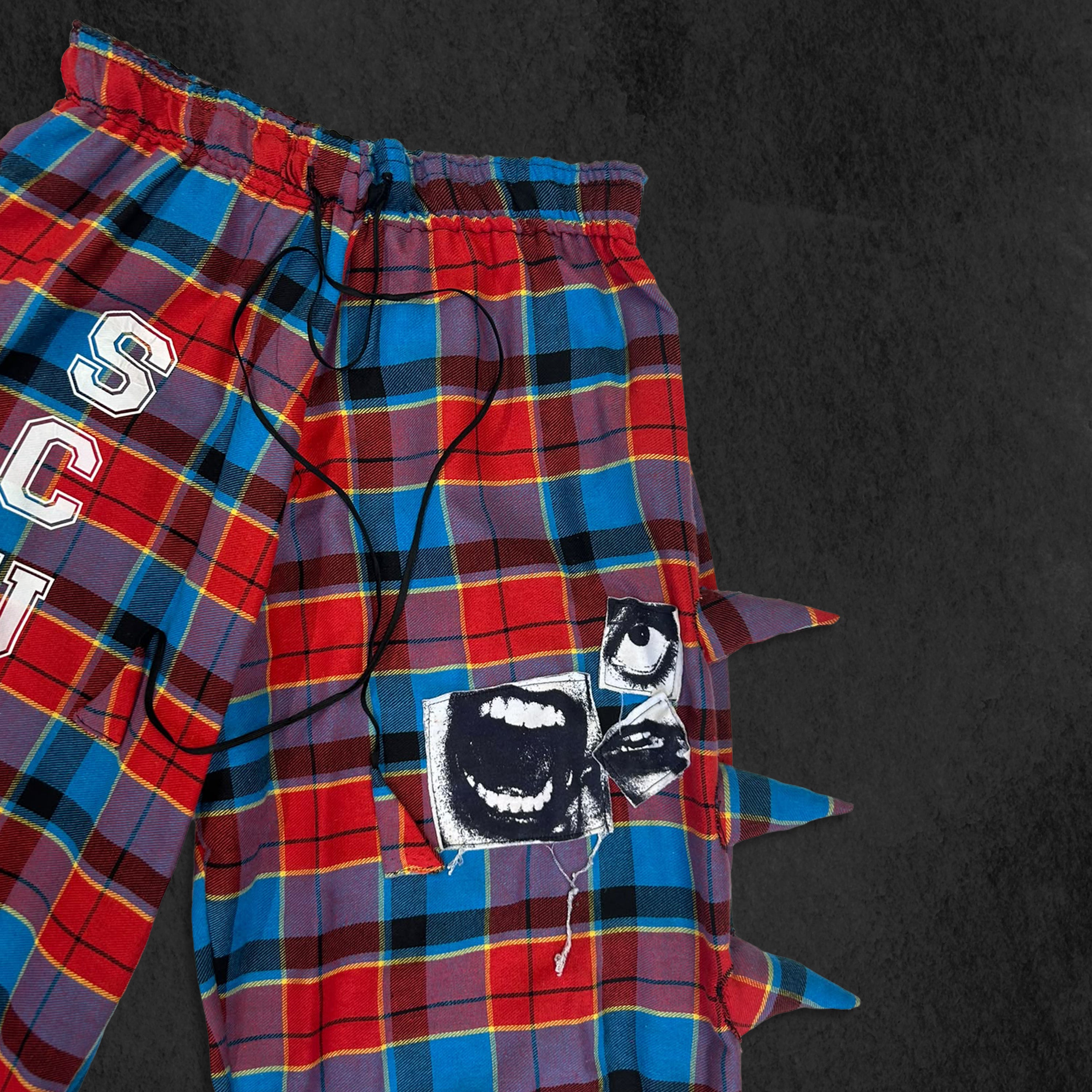 Spiked Up Tartan Trousers